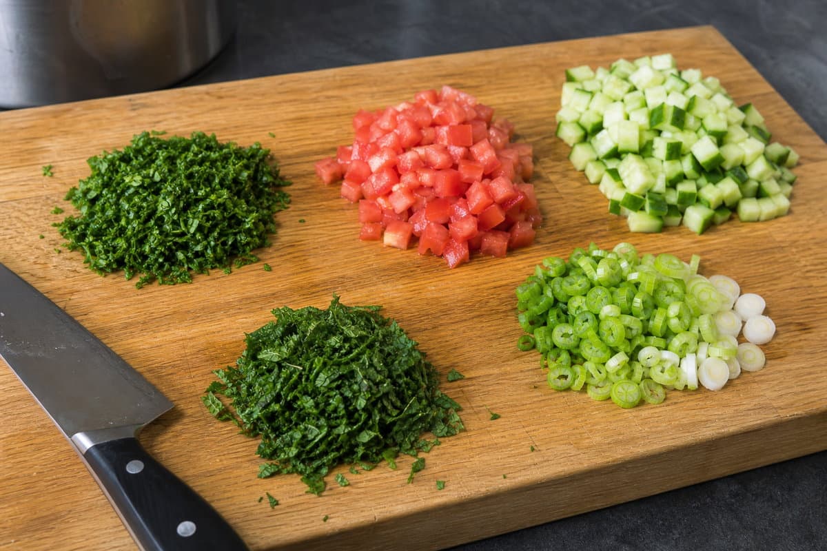 Chop the herbs and vegetables