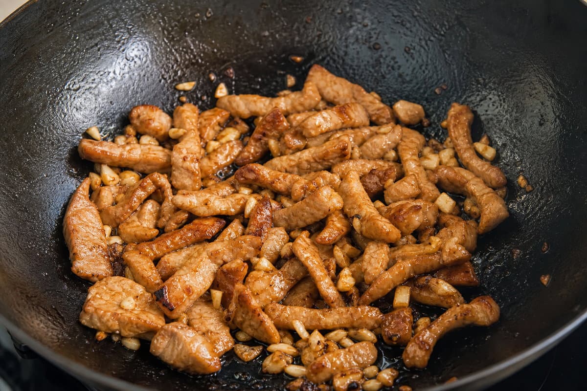 Stir-fry the pork