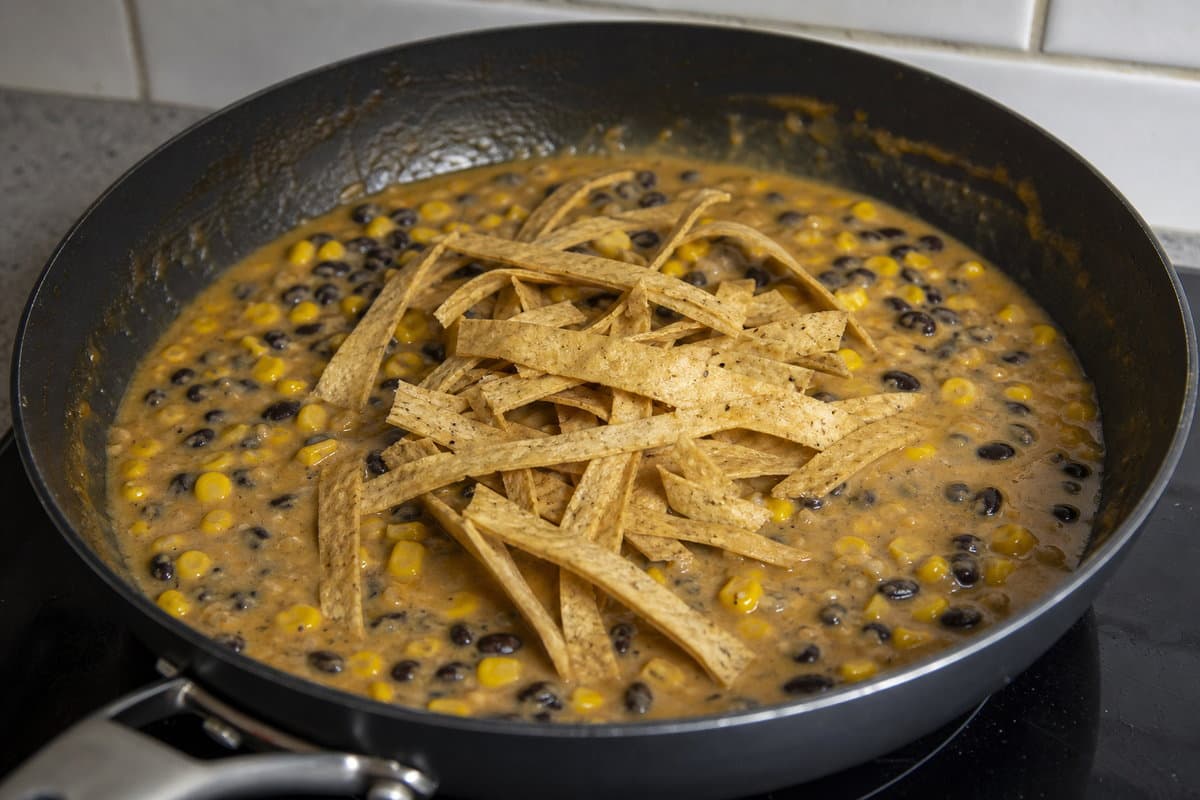 Fold in beans and tortillas
