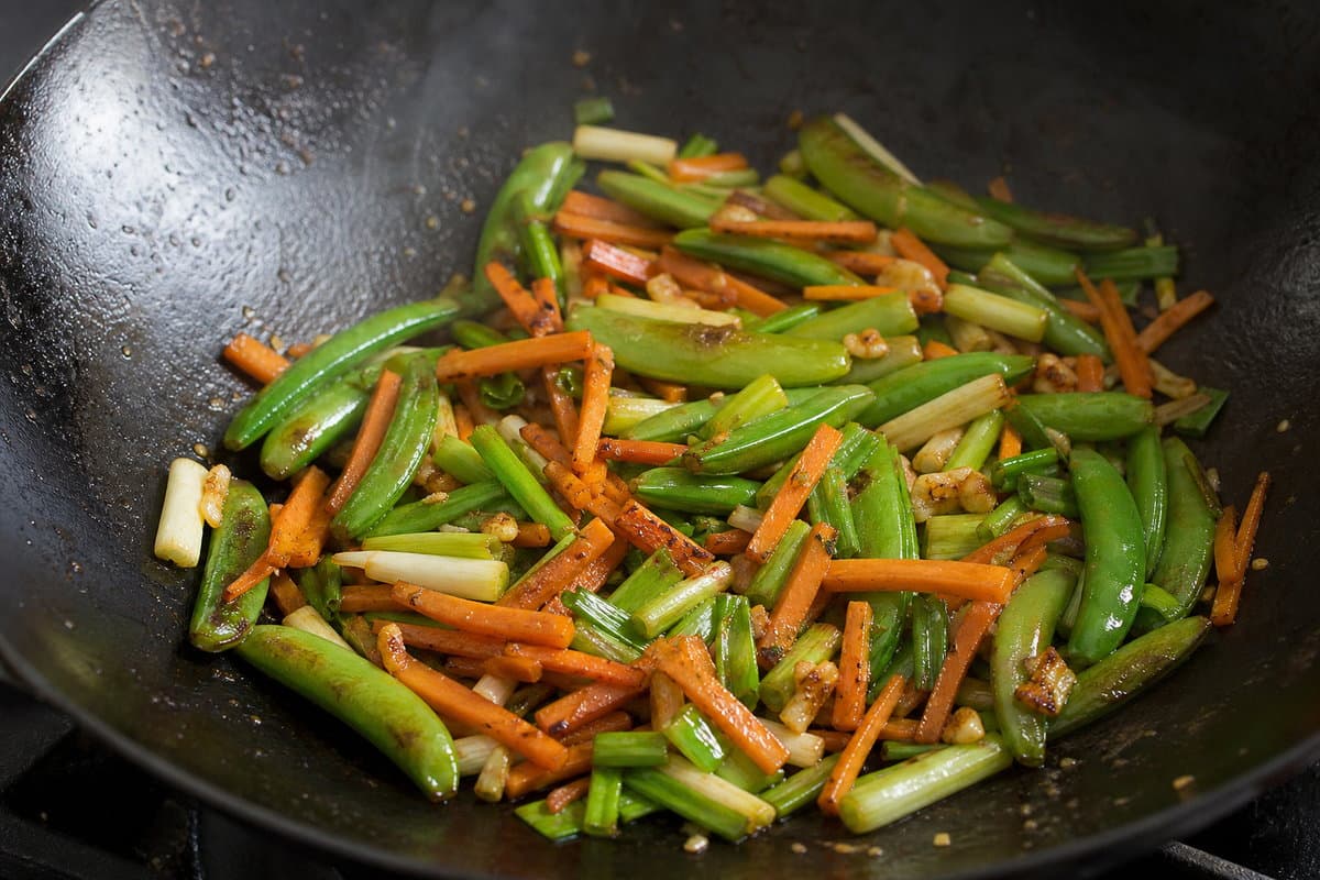 Stir-fry the vegetables